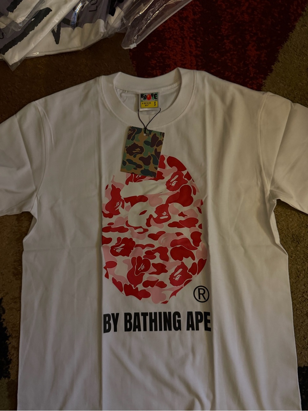 A Bathing Ape White Short-Sleeve Tee with Red Camo Ape Head